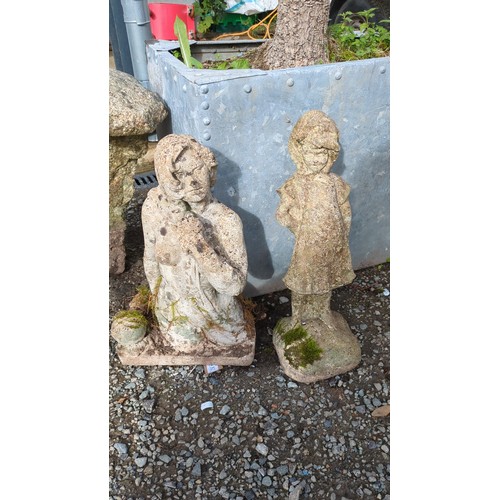 A pair concrete lady garden figures