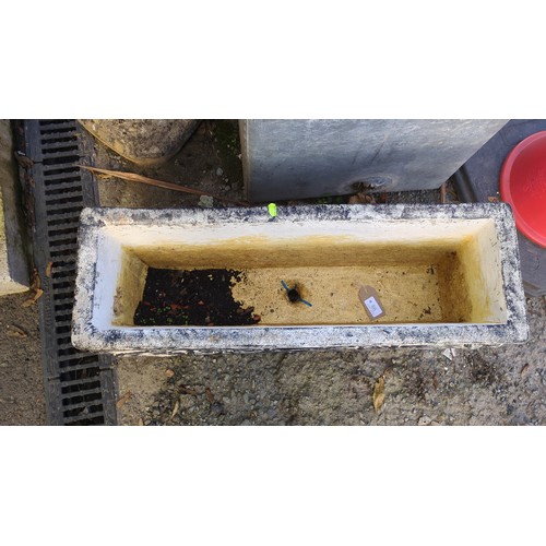 Rectangular cast-stone garden trough, the front moulded with a central ...