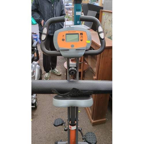 Songmics upright exercise bike with an LCD display for speed, time ...