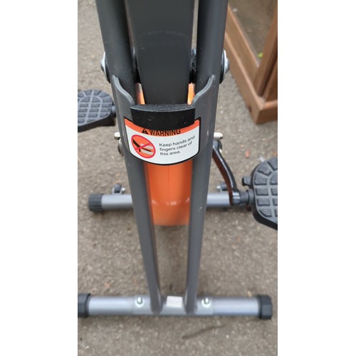 Songmics upright exercise bike with an LCD display for speed, time ...