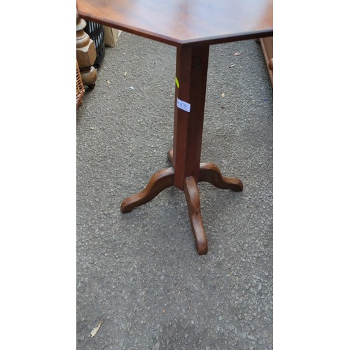 Octagonal occasional table with a single square pedestal and four swept ...
