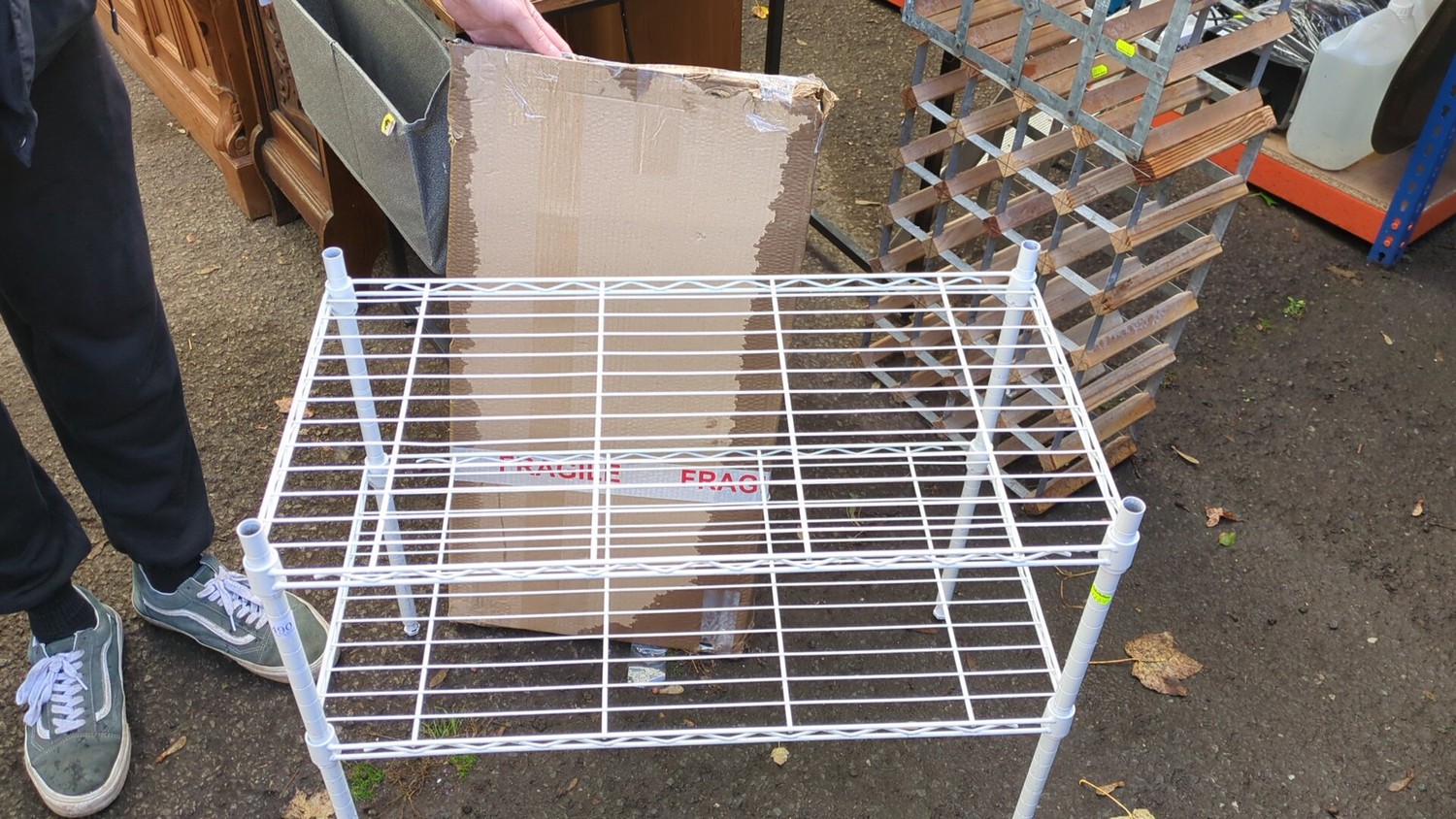 White-coated wire two-tier shelving unit with rectangular open-grid ...
