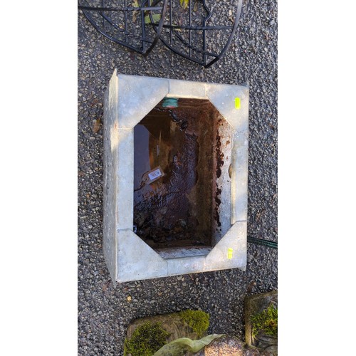 Rectangular galvanised steel water trough with an open, corner-braced ...