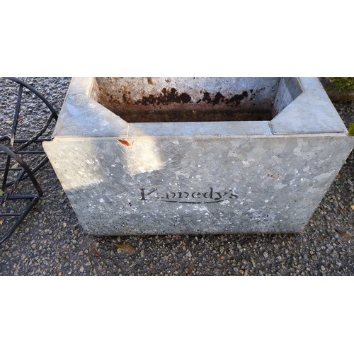 Rectangular galvanised steel water trough with an open, corner-braced ...