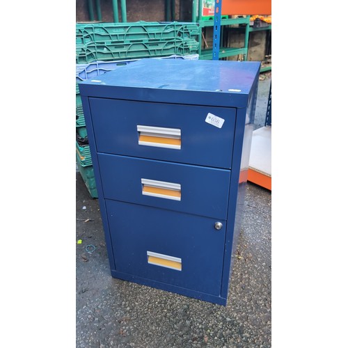 Blue-painted steel filing cabinet with three drawers, recessed label ...