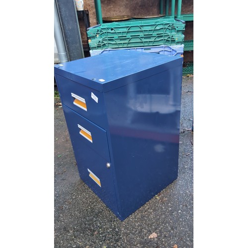 Blue-painted steel filing cabinet with three drawers, recessed label ...