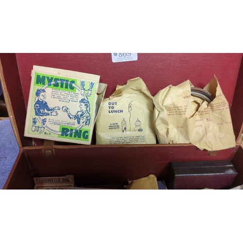 A collection of vintage conjuring tricks and apparatus, including ...