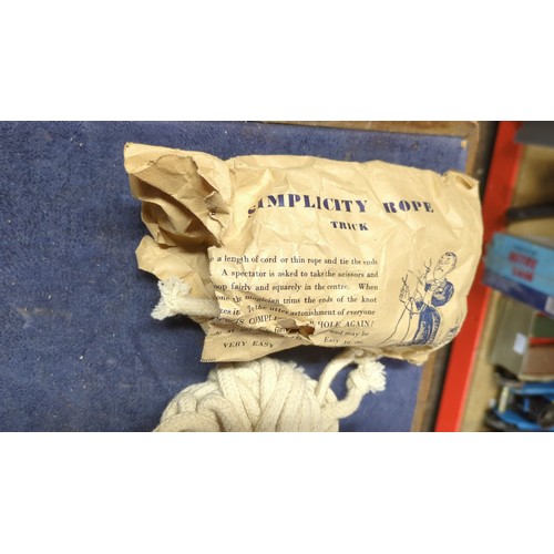 A collection of vintage conjuring tricks and apparatus, including ...