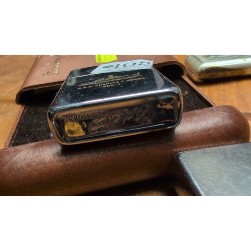 A group of smoking accessories comprising an Emu Brand metal cigarette ...