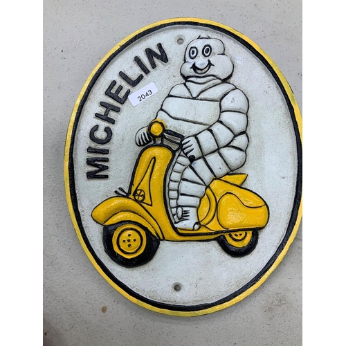 91 - CAST IRON MICHELIN MAN ON A SCOOTER
