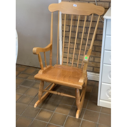 126 - WOODEN ROCKING CHAIR