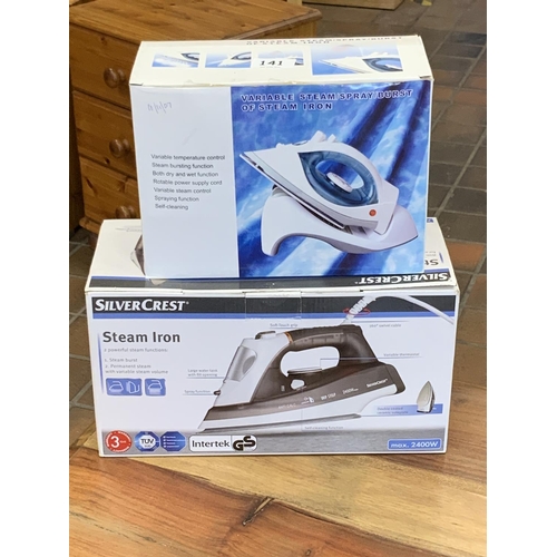 141 - 2 ELECTRIC STEAM IRONS IN BOXES