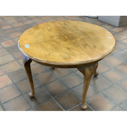 153 - ROUND OCC WALNUT TABLE WITH PADDED FEET