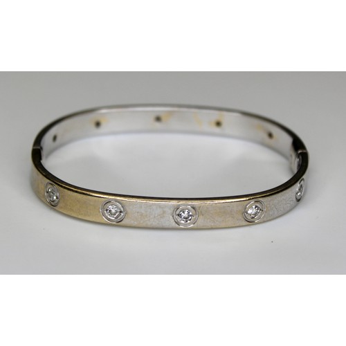 274 - DIAMOND SET TV SHAPE BANGLE WITH SCREW FITTINGS 9CT WHITE GOLD BIRMINGHAM 2007 -' RRP £3800