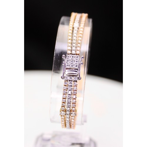 281 - ROUND BRILLIANT CUT DIAMOND TRIPLE ROW TENNIS STYLE BRACELET ESTIMATED TOTAL 6.17 CARATS 18CT YELLOW... 