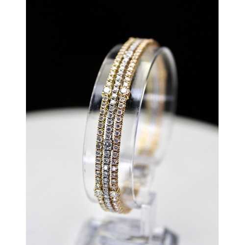 281 - ROUND BRILLIANT CUT DIAMOND TRIPLE ROW TENNIS STYLE BRACELET ESTIMATED TOTAL 6.17 CARATS 18CT YELLOW... 