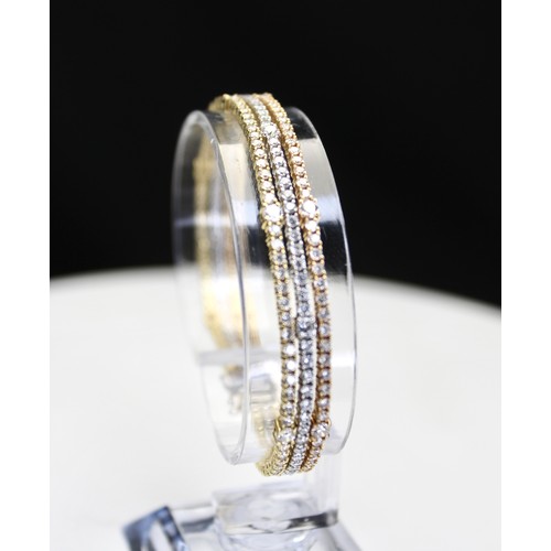 281 - ROUND BRILLIANT CUT DIAMOND TRIPLE ROW TENNIS STYLE BRACELET ESTIMATED TOTAL 6.17 CARATS 18CT YELLOW... 