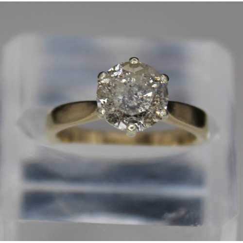 270 - 9CT GOLD DIAMOND SOLITAIRE RING -HEAVILY FLAWED