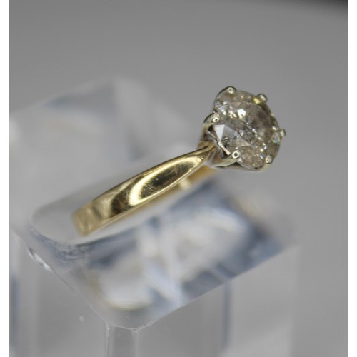 270 - 9CT GOLD DIAMOND SOLITAIRE RING -HEAVILY FLAWED