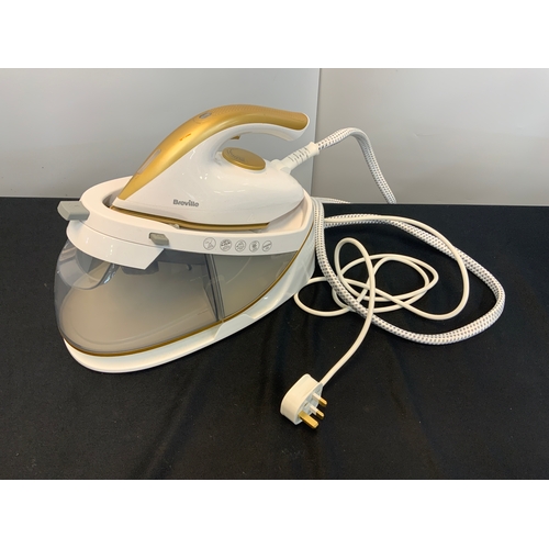 43 - BREVILLE STEAM IRON AND BASE MODEL VIN411O