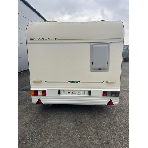 173 - APPROX 2007 ABBEY OXFORD COUNTY 4 BERTH CARAVAN WITH AWNING - CHASSIS NUMBER SW50060527