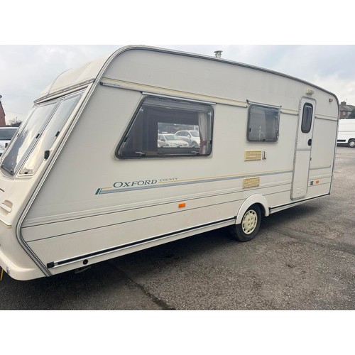 173 - APPROX 2007 ABBEY OXFORD COUNTY 4 BERTH CARAVAN WITH AWNING - CHASSIS NUMBER SW50060527