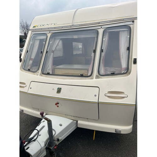 173 - APPROX 2007 ABBEY OXFORD COUNTY 4 BERTH CARAVAN WITH AWNING - CHASSIS NUMBER SW50060527