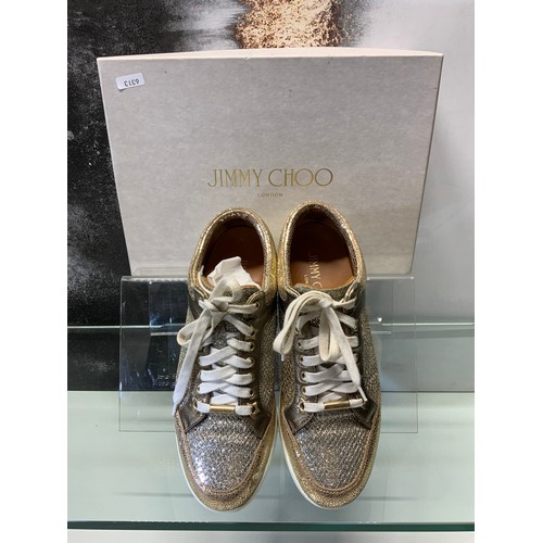 141 - JIMMY CHOO MIAMI CHAMPAGNE TRAINERS (GOLD)- IN BOX SIZE 38 - COST NEW £187 (P23039123 RR/16)