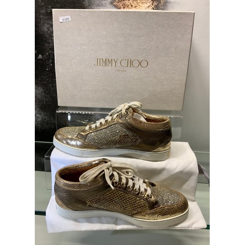 141 - JIMMY CHOO MIAMI CHAMPAGNE TRAINERS (GOLD)- IN BOX SIZE 38 - COST NEW £187 (P23039123 RR/16)