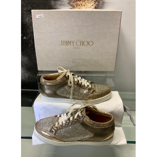 141 - JIMMY CHOO MIAMI CHAMPAGNE TRAINERS (GOLD)- IN BOX SIZE 38 - COST NEW £187 (P23039123 RR/16)