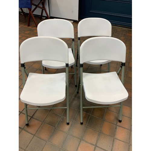 20 - 4 FOLDING WHITE CHAIRS