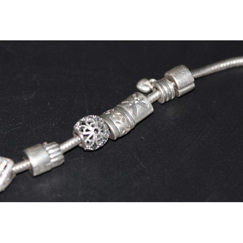 194 - PANDORA BRACELET WITH  10 CHARMS & 2 CLASPS A/F CLASP RRP APROX £320-£470 (P21086964/F)