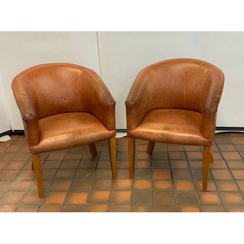 74 - 2 X VINTAGE LEATHER TUB CHAIRS (SMALL TEAR OF BACK OF ONE CHAIR)