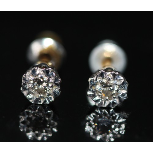 215 - PAIR OF 9CT GOLD DIAMOND STUD EARINGS ( P23066348 / C )