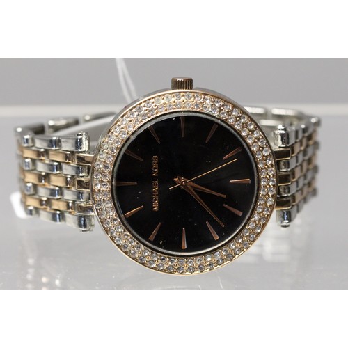 166 - MICHAEL KORS CARCI BLACK FACE TWO TONE S/S WATCH RRP £100 (P24067930 )