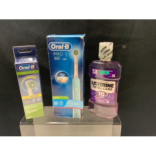 185 - ORAL B PRO 1 CROSS ACITON ELECTRIC TOOTHBRUSH, 1 XXL PACK OF CROSS ACTION TOOTHBRUSH HEADS, 1 BOTTLE... 