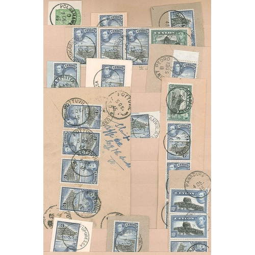 242 - Ceylon; old stockalbum with KG6 defins used on pieces, arranged alphabetically by postmark. (c.300)