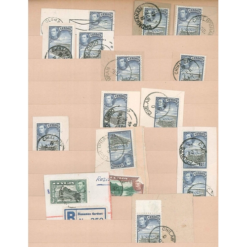 242 - Ceylon; old stockalbum with KG6 defins used on pieces, arranged alphabetically by postmark. (c.300)