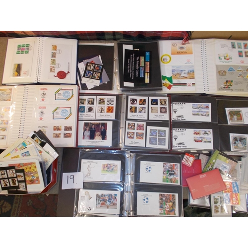 19 - Collections and Mixed Lots; Tub with 8 cover albums/photo albums and loose of world FDCs and some UK... 