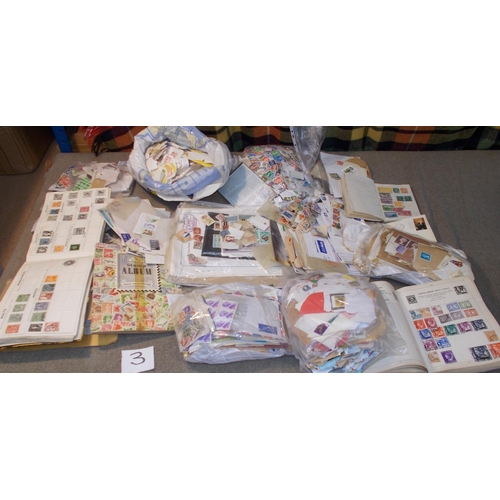 3 - Collections and Mixed Lots; a large box (some damp damage) of on/off-paper stamps, three albums/stoc... 