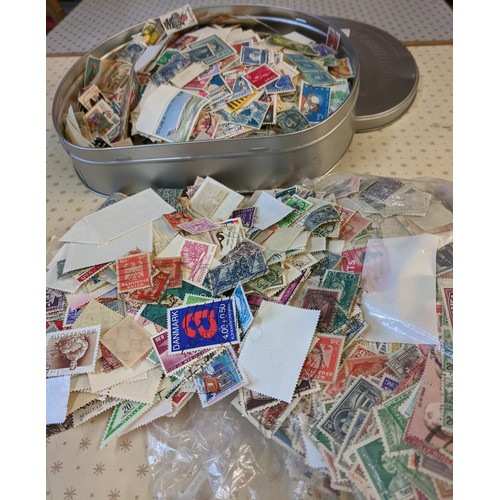 1 - Collections; biscuit tin crammed with c.700g of world off-paper stamps, little or no UK seen. (1,000... 