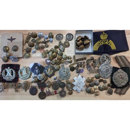 120 - Militaria; box of metal badges (uniform and others) and buttons, plus some cloth badges. See illustr... 