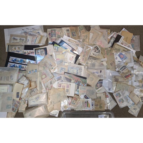 21 - Mixed Lots; plastic tub (shoebox-sized) with mix of world stamps in packets and on cards. Much non-C... 