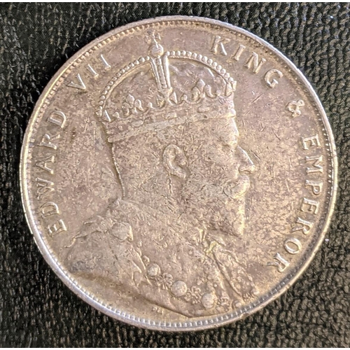 1053 - Coins; Straits Settlements; 1907 $1, obverse F, reverse VF+.