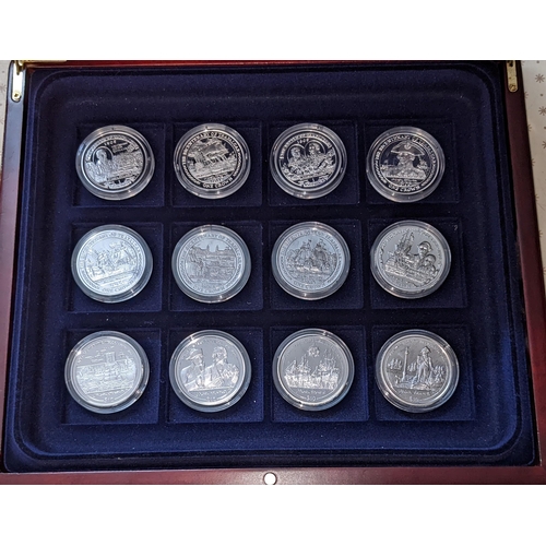 1208 - Coins; 2004-5 boxed set of 12 coins for Anniversaries of Trafalgar and Nelson, issued by Isle of Man... 