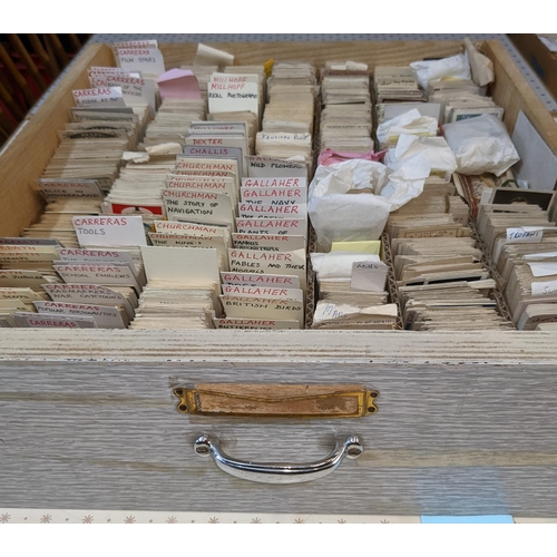 68 - Cigarette and Trade Cards; a large stock of mainly odd cards organised in seven drawers by company a... 