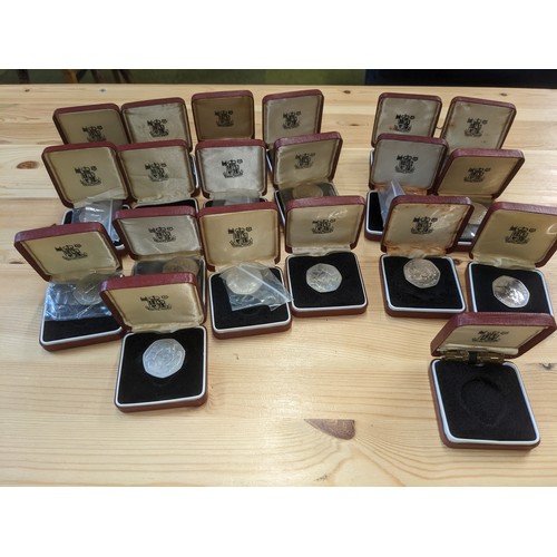 52 - Coins; UK; 1973 EEC 50p in original presentation boxes - some have coin loose, others in little pack... 