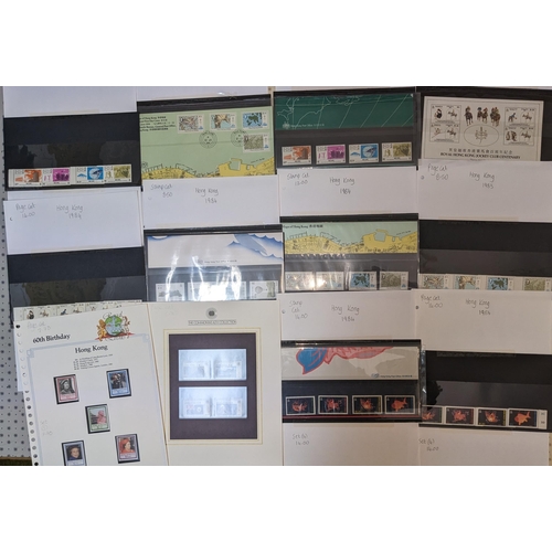 201 - Hong Kong; mixed bundle of about sixty pages from numerous collections, QV to modern, mint and used,... 