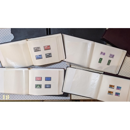 423 - UK Collections; 1952-70 mint and used collection in four albums, moderately complete, with the earli... 