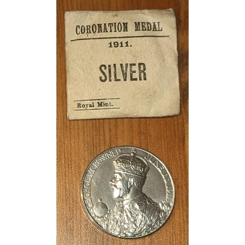 1201 - Medals; UK Official; 1911 Coronation 31mm silver medal unc. in original packet.... 